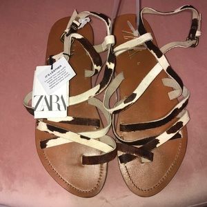 Zara leather cow print flat sandal.